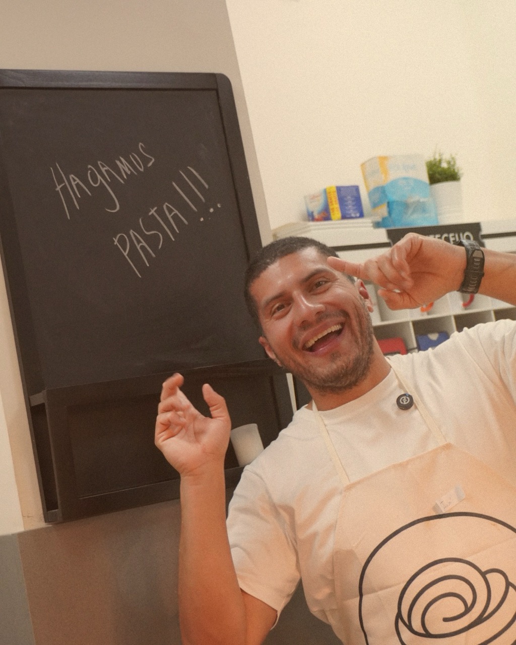 A person holding fresh pasta.